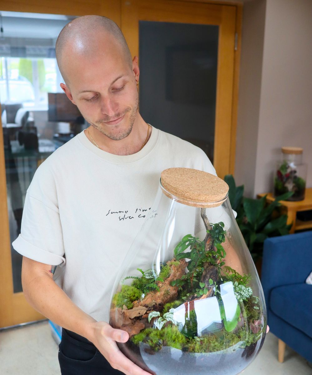 man with terrarium